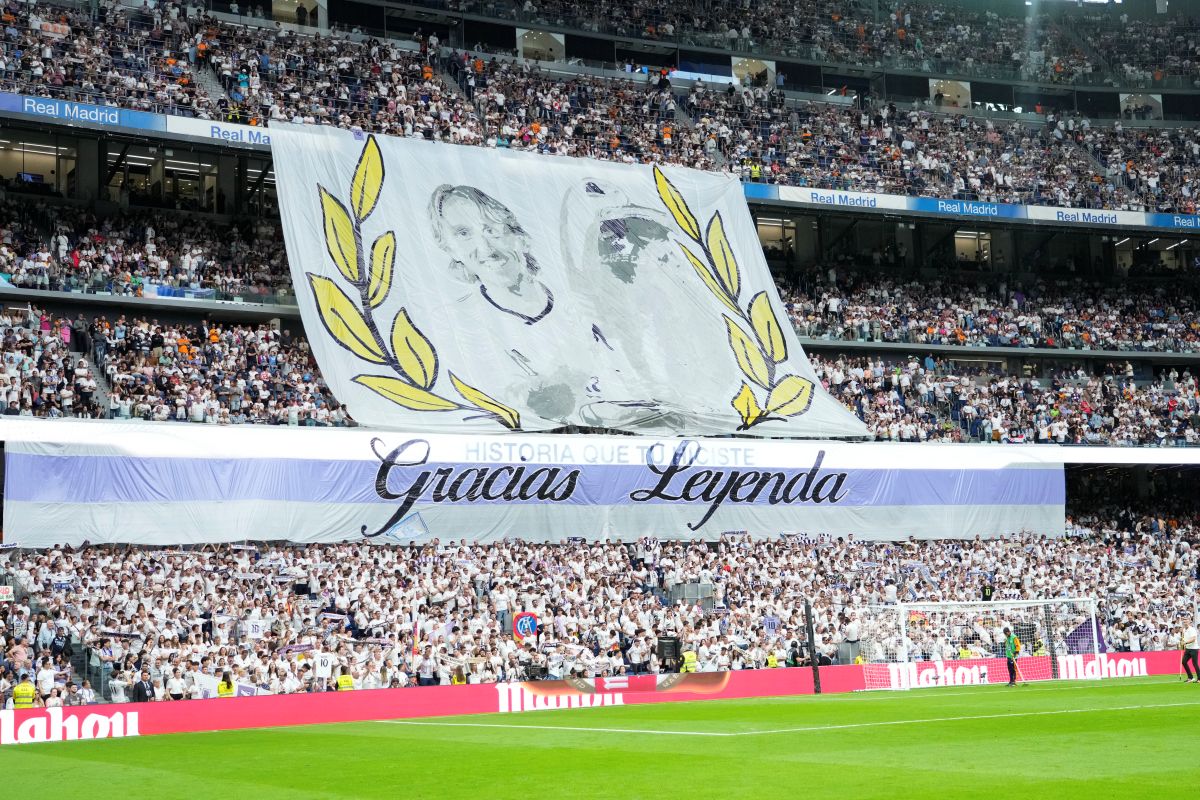 Real Madrid's fans display a banner prior to a Spanish La Liga soccer match against Real Sociedad at Santiago Bernabeu stadium in Madrid, Saturday, May 24, 2025. (AP Photo/Cesar Cebolla)