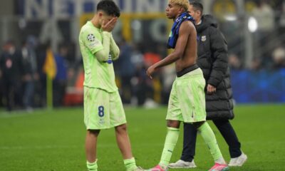 Barcelona's Pedri, left, and Lamine Yamal leave the pitch after the Champions League semifinal second leg soccer match between Inter Milan and Barcelona at San Siro stadium in Milan , Italy, Tuesday, May 6, 2025. (AP Photo/Antonio Calanni)