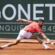 Novak Djokovic of Serbia returns a ball to Cameron Norrie of Britain, during their semi-final match, at the ATP 250 Geneva Open tournament in Geneva, Switzerland, Friday, May 23, 2025. (Martial Trezzini/Keystone via AP)