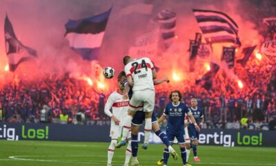 Stuttgart's Jeff Chabot heads the ball during the German soccer cup, DFB Pokal, final match between Arminia Bielefeld and VfB Stuttgart at Olympiastadion in Berlin, Germany, Saturday, May 24, 2025. (AP Photo/Matthias Schrader)