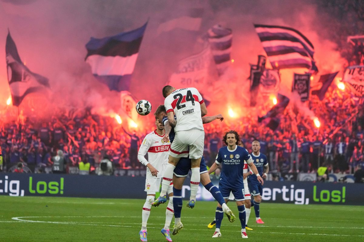 Stuttgart's Jeff Chabot heads the ball during the German soccer cup, DFB Pokal, final match between Arminia Bielefeld and VfB Stuttgart at Olympiastadion in Berlin, Germany, Saturday, May 24, 2025. (AP Photo/Matthias Schrader)