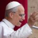FILE- Pope Leo XIV speaks from the central balcony of St. Peter's Basilica on Sunday, May 11, 2025. (AP Photo/Domenico Stinellis, File)