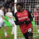 FILE - Leverkusen's Jeremie Frimpong celebrates after he scored his side's second goal during the German Bundesliga soccer match between Bayer Leverkusen and TSG Hoffenheim at the BayArena in Leverkusen, Germany, Sunday, Feb. 2, 2025. (AP Photo/Martin Meissner, File)