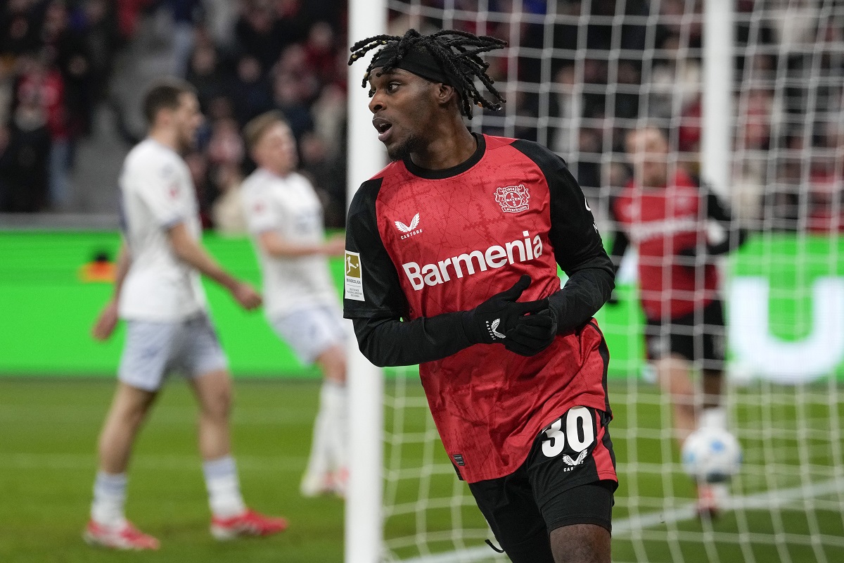 FILE - Leverkusen's Jeremie Frimpong celebrates after he scored his side's second goal during the German Bundesliga soccer match between Bayer Leverkusen and TSG Hoffenheim at the BayArena in Leverkusen, Germany, Sunday, Feb. 2, 2025. (AP Photo/Martin Meissner, File)