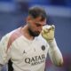 PSG's goalkeeper Gianluigi Donnarumma wipes his face during a training session ahead of the Champions League final soccer match between Paris Saint-Germain and Inter Milan at the Allianz Arena in Munich, Germany, Friday, May 30, 2025. (AP Photo/Matthias Schrader)