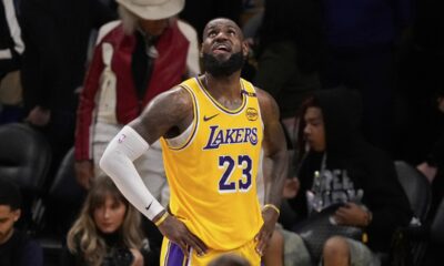 Los Angeles Lakers forward LeBron James looks up toward the scoreboard in the closing seconds in Game 5 of an NBA basketball first-round playoff series against the Minnesota Timberwolves, Wednesday, April 30, 2025, in Los Angeles. (AP Photo/Mark J. Terrill)