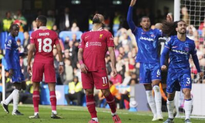 Liverpool's Mohamed Salah, center, reacts after missing a chance to score during the English Premier League soccer match between Chelsea and Liverpool at Stamford Bridge stadium in London, Sunday, May 4, 2025. (AP Photo/Kin Cheung)