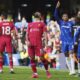 Liverpool's Mohamed Salah, center, reacts after missing a chance to score during the English Premier League soccer match between Chelsea and Liverpool at Stamford Bridge stadium in London, Sunday, May 4, 2025. (AP Photo/Kin Cheung)