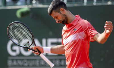 Novak Djokovic, of Serbia, reacts after losing a point to Cameron Norrie of Britain, during their semi-final match, at the ATP 250 Geneva Open tournament in Geneva, Switzerland, Friday, May 23, 2025. (Martial Trezzini/Keystone via AP)