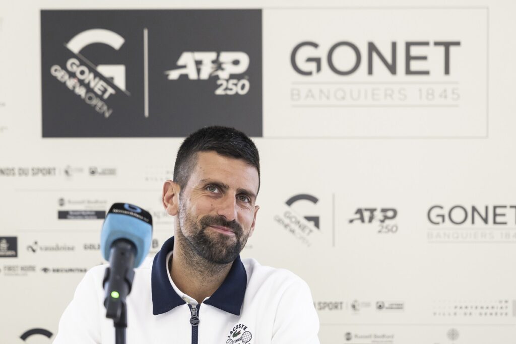 Novak Djokovic, of Serbia, talks to the media during a press conference at the Geneva Open tennis tournament, Tuesday, May 20, 2025, in Geneva, Switzerland. (Cyril Zingaro/Keystone via AP)
