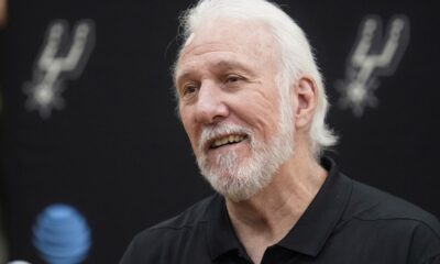 FILE - San Antonio Spurs head coach Gregg Popovich smiles during the NBA basketball team's media day, Monday, Sept. 27, 2021, in San Antonio. (AP Photo/Eric Gay, File)