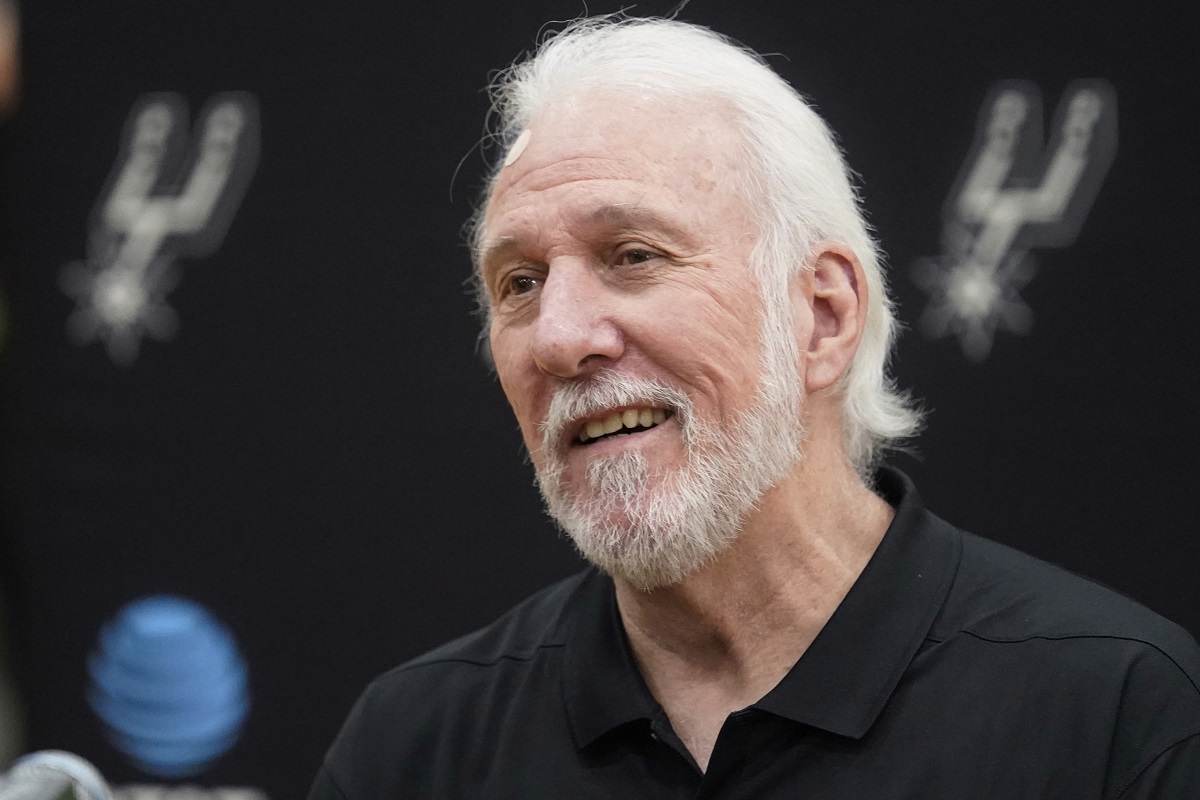 FILE - San Antonio Spurs head coach Gregg Popovich smiles during the NBA basketball team's media day, Monday, Sept. 27, 2021, in San Antonio. (AP Photo/Eric Gay, File)