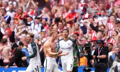 Sunderland's Tom Watson celebrates scoring his side's second goal during the Sky Bet Championship play off final between Sheffield United and Sunderland, at Wembley Stadium, London, Saturday May 24, 2025. (John Walton/PA via AP)