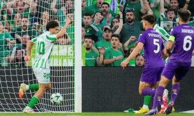 Betis' Abde Ezzalzouli celebrates after scoring during the Conference League semifinal first leg soccer match between Betis and Fiorentina at the Benito Villamarin stadium in Seville, Spain, Thursday, May 1, 2025. (AP Photo/Jose Breton)