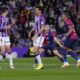 Barcelona's Raphinha, right, celebrates after scoring his side's first goal during the Spanish La Liga soccer match between Valladolid and FC Barcelona at the Jose Zorrilla stadium in Valladolid, Spain, Saturday, May 3, 2025. (AP Photo/Manu Fernandez)