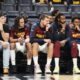 Denver Nuggets' Nikola Jokic, center, and the rest of the bench watch play against the Oklahoma City Thunder late in the second half of Game 2 in the conference semifinals of the NBA basketball playoffs, Wednesday, May 7, 2025, in Oklahoma City. (AP Photo/Kyle Phillips)