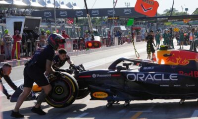 Red Bull driver Yuki Tsunoda of Japan gets pushed back into his garage during the second free practice at the Enzo and Dino Ferrari racetrack, ahead the Italy's Emilia Romagna Formula One Grand Prix, in Imola, Italy, Friday, May 16, 2025. (AP Photo/Luca Bruno)