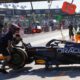 Red Bull driver Yuki Tsunoda of Japan gets pushed back into his garage during the second free practice at the Enzo and Dino Ferrari racetrack, ahead the Italy's Emilia Romagna Formula One Grand Prix, in Imola, Italy, Friday, May 16, 2025. (AP Photo/Luca Bruno)