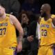 Los Angeles Lakers guard Luka Doncic (77) walks off the court after an injury during the first half in Game 5 of an NBA basketball first-round playoff series against the Minnesota Timberwolves, Wednesday, April 30, 2025, in Los Angeles. (AP Photo/Mark J. Terrill)