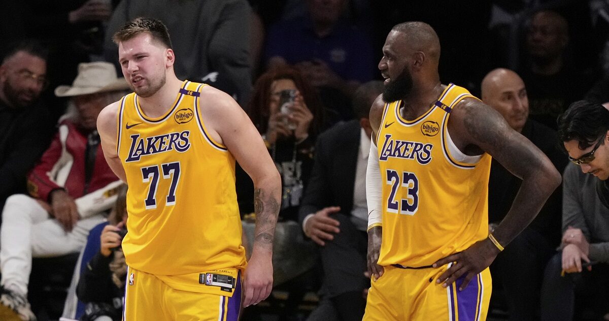 Los Angeles Lakers guard Luka Doncic (77) walks off the court after an injury during the first half in Game 5 of an NBA basketball first-round playoff series against the Minnesota Timberwolves, Wednesday, April 30, 2025, in Los Angeles. (AP Photo/Mark J. Terrill)