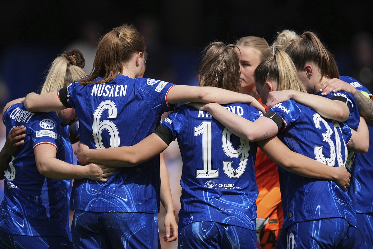 Chelsea players wear black armbands worn to remember Pope Francis during the women's Champions League semifinals, second leg, soccer match between Chelsea FC and FC Barcelona at Stamford Bridge in London, Sunday, April 27, 2025. (AP Photo/Dave Shopland)