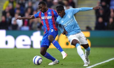 Crystal Palace's Tyrick Mitchell, left, and Nottingham Forest's Anthony Elanga battle for the ball during the English Premier League soccer match between Crystal Palace and Nottingham Forest at Selhurst Park, London, Monday, May 5, 2025. (Bradley Collyer/PA via AP)