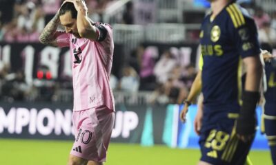 Inter Miami forward Lionel Messi (10) reacts after missing shot on the goal during the first half of a CONCACAF Champions Cup second-leg semifinal soccer match against the Vancouver Whitecaps, Wednesday, April 30, 2025, in Fort Lauderdale, Fla. (AP Photo/Lynne Sladky)