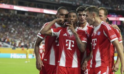 Bayern Munich's Michael Olise, second from left, celebrates scoring his side's 2nd goal during the Club World Cup Group C soccer match between Bayern Munich and Boca Juniors in Miami Gardens, Fla., Friday, June 20, 2025. (AP Photo/Rebecca Blackwell)