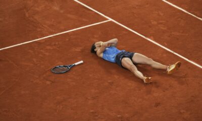 France's Lois Boisson celebrates as she won the quarterfinal match of the French Tennis Open against Russia's Mirra Andreeva at the Roland-Garros stadium in Paris, Wednesday, June 4, 2025. (AP Photo/Christophe Ena)