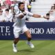 Novak Djokovic hits a volley against Karen Khachanov during the Giorgio Armani Tennis Classic at The Hurlingham Club, Friday, June 27, 2025, in London. (Jonathan Brady/PA via AP)