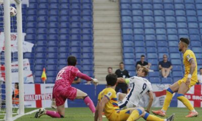 England's Harry Kane, second right, scores the opening goal during a World Cup 2026 group K qualifying soccer match between Andorra and England at the RCDE Stadium in Barcelona, Spain, Saturday, June 7, 2025. (AP Photo/Joan Monfort)