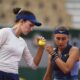 Kazakhstan's Anna Danilina, left, and Serbia's Aleksandra Krunic talk as they play against Norway's Ulrikke Eikeri and Japan's Eri Hozumi during their women's doubles semifinal match of the French Tennis Open at the Roland-Garros stadium in Paris, Friday, June 6, 2025. (AP Photo/Lindsey Wasson)