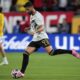 Los Angeles FC's Olivier Giroud warms up before the Club World Cup Group D soccer match between Los Angeles FC and Flamengo in Orlando, Fla., Tuesday, June 24, 2025. (AP Photo/John Raoux)