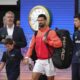 Serbia's Novak Djokovic enters the court for the quarterfinal match of the French Tennis Open against Germany's Alexander Zverev at the Roland-Garros stadium in Paris, Wednesday, June 4, 2025. (AP Photo/Aurelien Morissard)