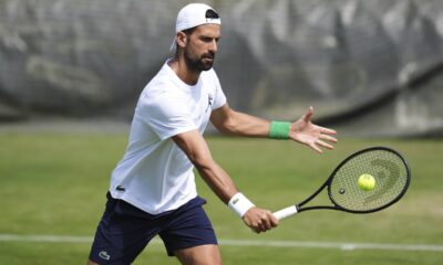 Novak Djokovic during a practice session at the All England Lawn Tennis and Croquet Club in Wimbledon ahead of the Wimbledon Championships, Friday June 27, 2025. (John Walton/PA via AP)