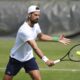 Novak Djokovic during a practice session at the All England Lawn Tennis and Croquet Club in Wimbledon ahead of the Wimbledon Championships, Friday June 27, 2025. (John Walton/PA via AP)