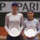 Second placed Kazakhstan Anna Danilina, left, and Serbia's Aleksandra Krunic pose with their trophies after the women's doubles final match of the French Tennis Open against winners Italy's Jasmine Paolini and Sara Errani at the Roland-Garros stadium in Paris, Sunday, June 8, 2025. (AP Photo/Thibault Camus)