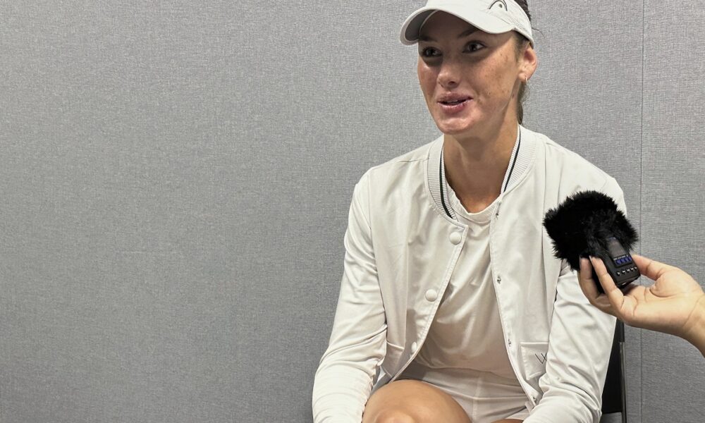 Carson Branstine, a tennis player who went to Texas A&M University and represents Canada, speaks to reporters at the All England Club in Wimbledon, London, Saturday, June 28, 2025. (AP Photo/Howard Fendrich)