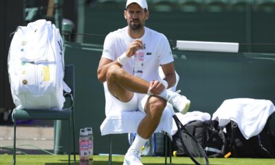 Novak Djokovic of Serbia sits in his chair during a practice session at the All England Lawn Tennis and Croquet Club, ahead of the Wimbledon Championships in London, Wednesday, June 25, 2025. (AP Photo/Kirsty Wigglesworth)