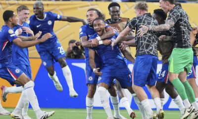 Chelsea's Christopher Nkunku is congratulated after scoring his teams second goal during the Club World Cup round of 16 soccer match between Benfica and Chelsea in Charlotte, N.C., Saturday, June 28, 2025. (AP Photo/Chris Carlson)
