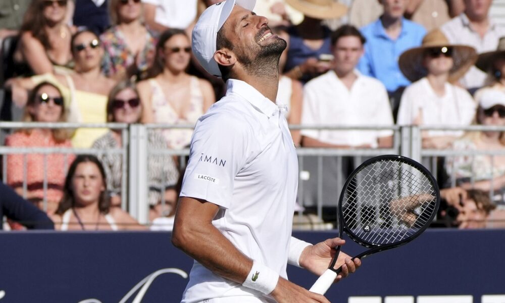 Serbia's Novak Djokovic reacts during the match against Karen Khachanov of the US during the Tennis Classic at The Hurlingham Club, in London, Friday, June 27, 2025. (Jonathan Brady/PA via AP)