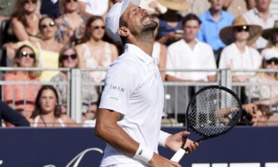 Serbia's Novak Djokovic reacts during the match against Karen Khachanov of the US during the Tennis Classic at The Hurlingham Club, in London, Friday, June 27, 2025. (Jonathan Brady/PA via AP)