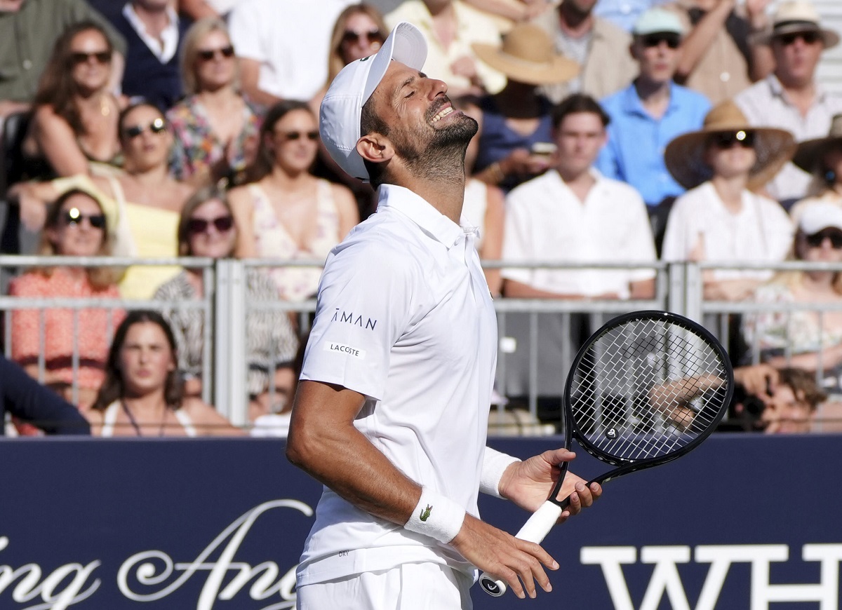 Serbia's Novak Djokovic reacts during the match against Karen Khachanov of the US during the Tennis Classic at The Hurlingham Club, in London, Friday, June 27, 2025. (Jonathan Brady/PA via AP)