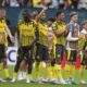Players of Borussia Dortmund stand on the pitch at the end of the Club World Cup group F soccer match between Fluminense and Borussia Dortmund in East Rutherford, N.J., Tuesday, June 17, 2025. (AP Photo/Frank Franklin II)