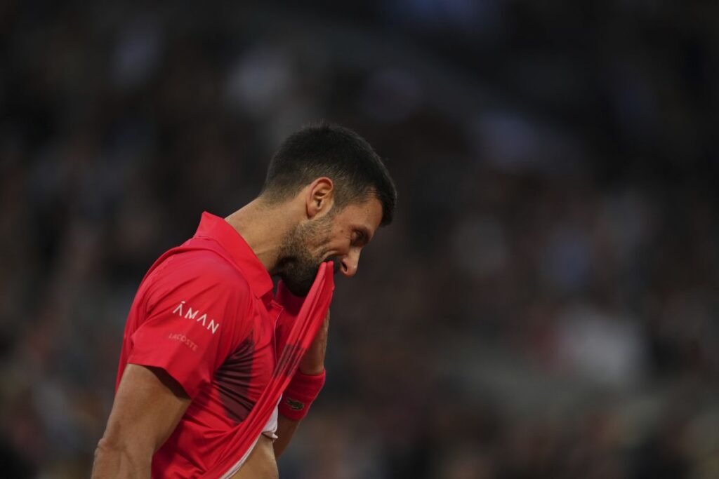 Serbia's Novak Djokovic reacts as he plays against Germany's Alexander Zverev during their quarterfinal match of the French Tennis Open at the Roland-Garros stadium in Paris, Wednesday, June 4, 2025. (AP Photo/Lindsey Wasson)