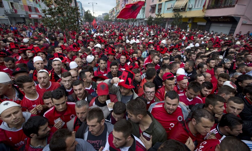 FILE - Albania fans wait to be searched by police before the Group I Euro 2016 qualifying match between Albania and Serbia in Elbasan, central Albania, Oct. 8, 2015. (AP Photo/Visar Kryeziu, File)