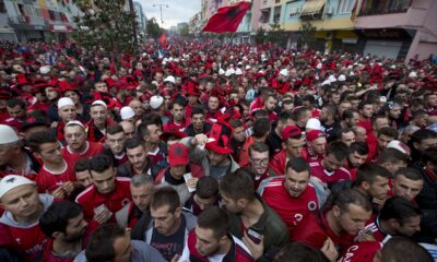 FILE - Albania fans wait to be searched by police before the Group I Euro 2016 qualifying match between Albania and Serbia in Elbasan, central Albania, Oct. 8, 2015. (AP Photo/Visar Kryeziu, File)