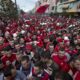 FILE - Albania fans wait to be searched by police before the Group I Euro 2016 qualifying match between Albania and Serbia in Elbasan, central Albania, Oct. 8, 2015. (AP Photo/Visar Kryeziu, File)