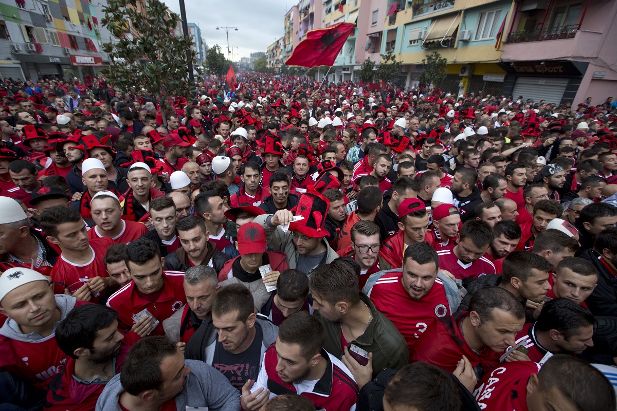 FILE - Albania fans wait to be searched by police before the Group I Euro 2016 qualifying match between Albania and Serbia in Elbasan, central Albania, Oct. 8, 2015. (AP Photo/Visar Kryeziu, File)