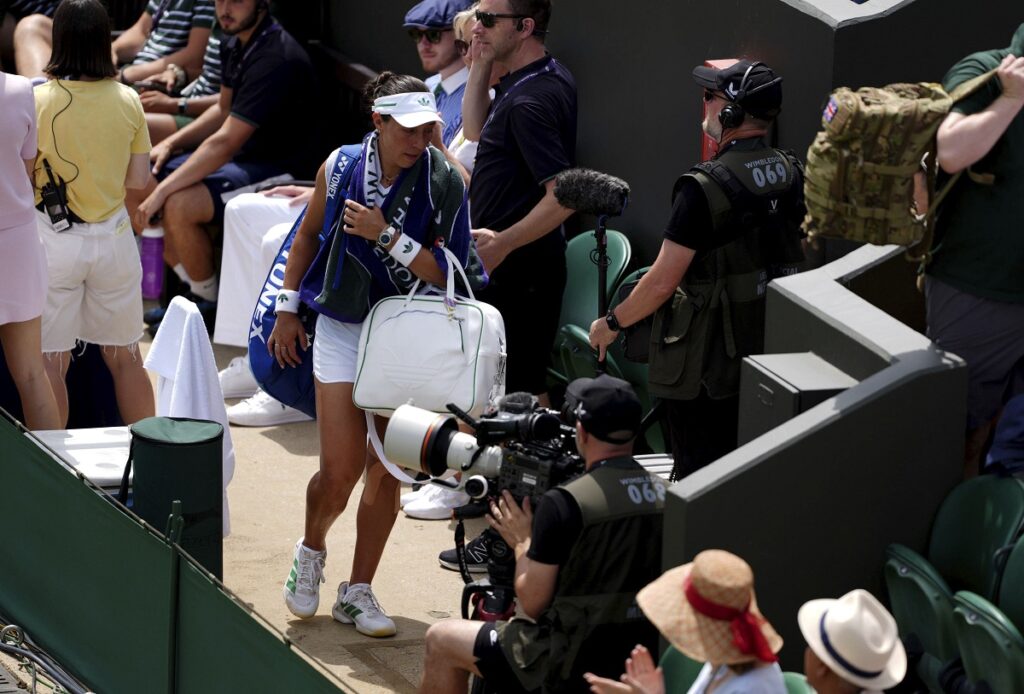 Jessica Pegula of the U.S. leaves the court after losing to Elisabetta Cocciaretto of Italy during their women's first round singles match at the Wimbledon Tennis Championships in London, Tuesday, July 1, 2025. (Ben Whitley/PA via AP)